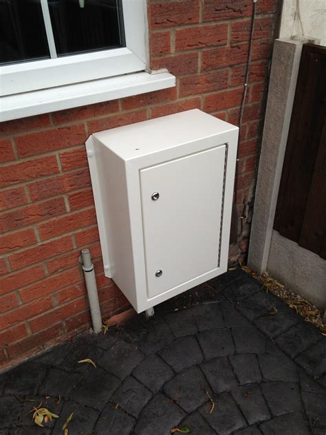 small electric meter box|electrical meter box outside house.